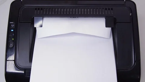 Close up getting Print of Advertainment on Paper from Printer Stock Footage 124086128