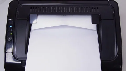 Close up getting Print of Impact! on Paper from Printer Stock Footage 123857648