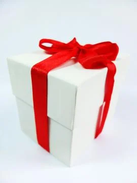 Close Up of Gift Box With Red Bow Isolated on White Background Stock Photos