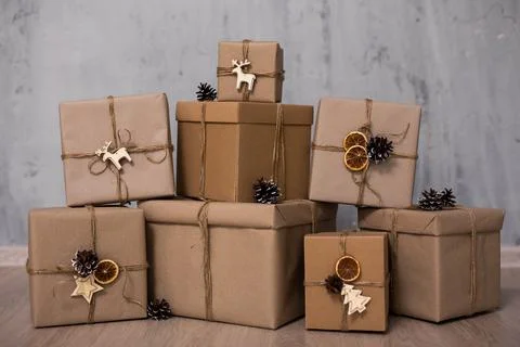 Close up of gift boxes over grey wall 写真素材
