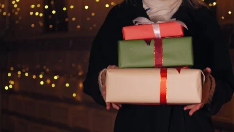 Close-up of gift boxes in women's hands. Stock Footage 280266514