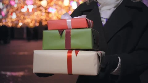 Close-up of gift boxes in women's hands. Stock Footage 280270080