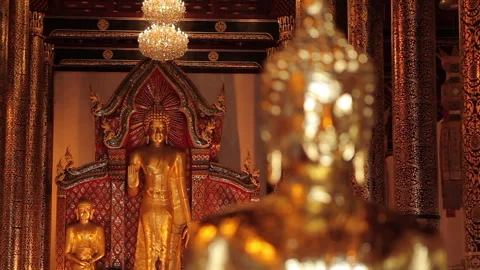 Close-Up of Gilded Thai Buddha Statue at Traditional Temple Stock-Footage 333706168