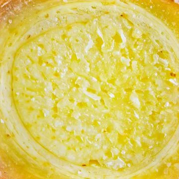 Close up ginger slice showing organic spice texture and natural plant food .. Stock Photos