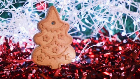 Close-up of gingerbread christmas tree on festive New Year background. 動画素材 144688642