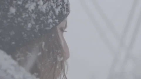 Close up of girl in blizzard Stock Footage 61472966