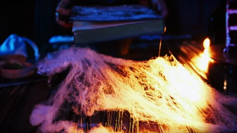 Close-up of a girl in the form of a witch looking at the camera. Video stock 287415560