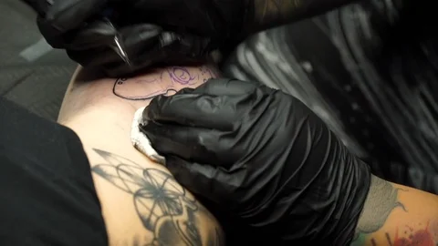 Close up of a girl getting a tattoo 4 Stock Footage 121982950