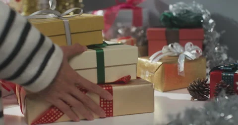 Close up of girl hands preparing present gift box winter christmas decorations. Stock Footage 166915806