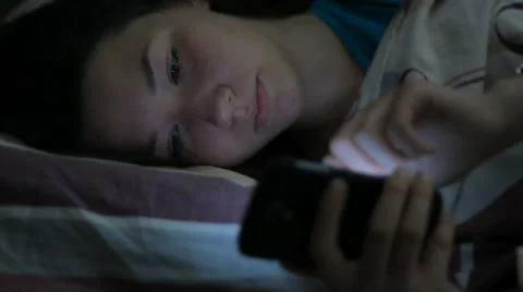 Close-up of girl with a phone, night, now Stock Footage