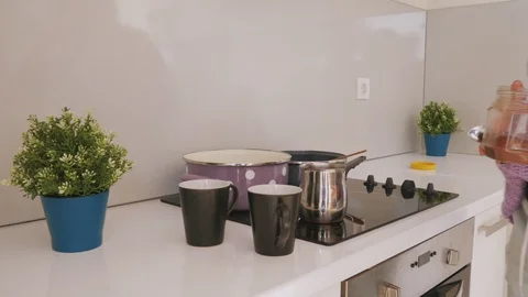 Close up of a girl preparing cup of coffee Stock Footage 99398342