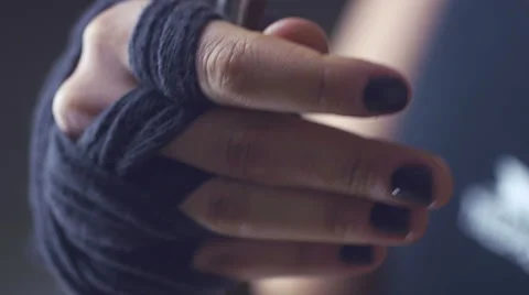 Close-up of a girl pulls on the hand chain Stock Footage 61870307