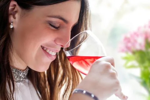 Close up of girl smelling wine. Stock Photos