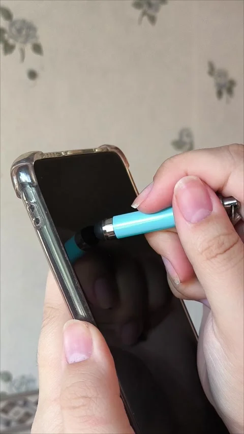 Close up, a girl using smartphone with holding stylus pen Stock Footage 313185044