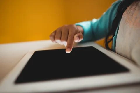 Close up of girl using a tablet Foto stock
