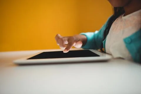 Close up of girl using a tablet Foto stock