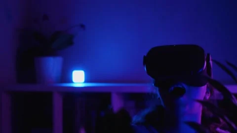 Close-up of a girl in VR glasses in a Stock Video Pond5