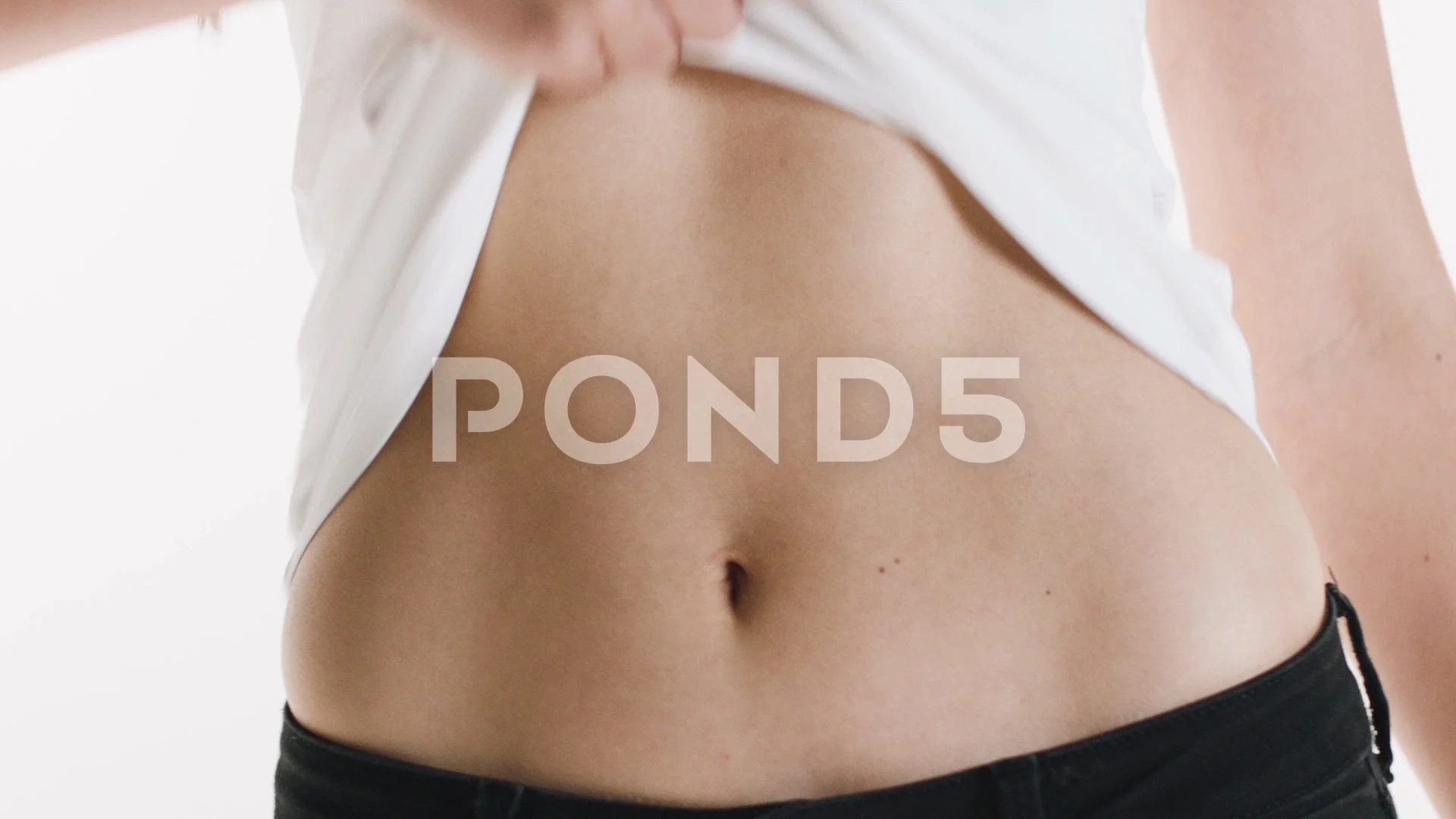 Close-up of a girl's fit and slim belly , Stock Video