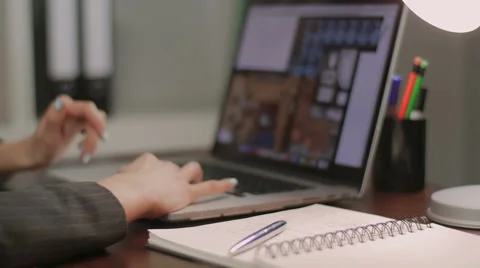 Close-up of girls hands looking on the plan of the house Stock Footage 58590692