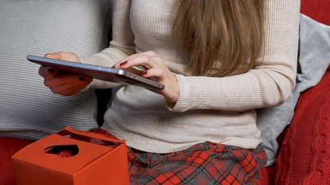Close-up of the girl's hands using a tablet, the Internet, social networks, typi Video stock 121841511