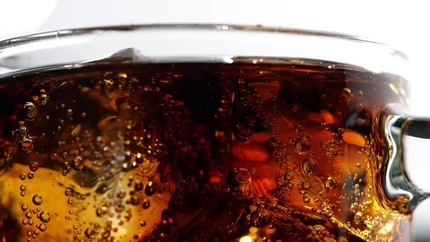 Close-up glass of cold cola with bubble in slow motion Video stock 126953113