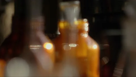 Close-up of glass flasks, tubes on the table. Vintage cinematic concept. Work Video stock 200276265