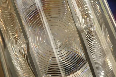 Close-up of glass lens patterns creating mesmerizing optical illusions Stock Photos