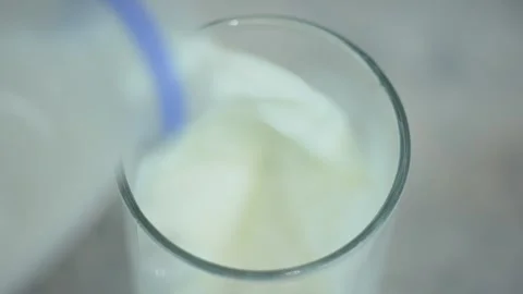 Close-up. A glass of milk. Stock Footage 245761193