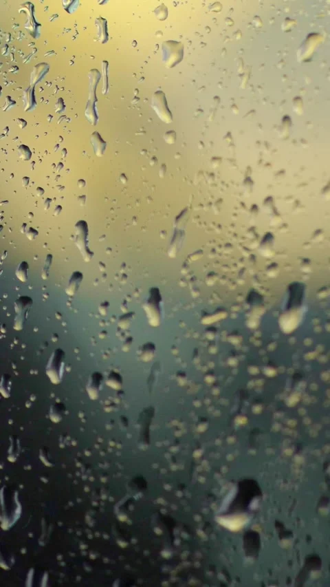Close-up, on the glass there are large drops of rain, water, drops of water on a Stock Footage 315940359