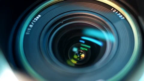 Close-up glass of wide-angle professional lens with neon flashes Stock Footage 145481020