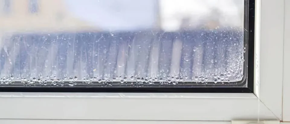 Close-up of glass window with raindrops on surface Stock Photos