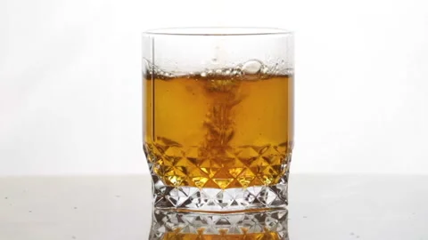 Close-up of a glass of yellow water. Stock Footage 239226576