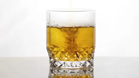 Close-up of a glass of yellow water. Stock Footage 239226583
