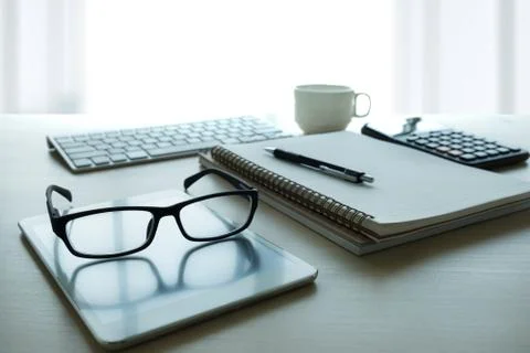 Close up of glasses and computer  business workplace work place in office Stock Photos