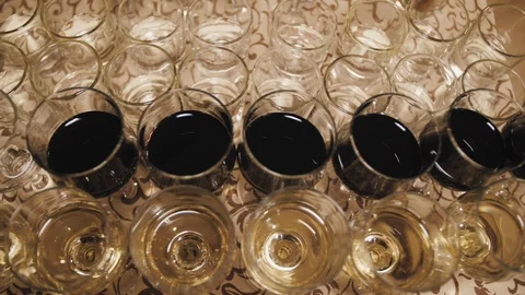 Close up of glasses of wine on a table during a wine tasting Stock Footage 98657539