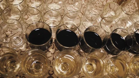 Close up of glasses of wine on a table during a wine tasting Stock-Footage 98657548