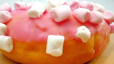 Close up glazed donuts set with chocolate and marshmallows Stock Footage 107672357