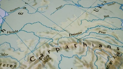 Close up gliding shot toward the carpathians on a relief map Stock Footage 341699070