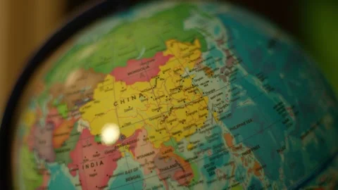 Close-up of globe, highlighting Asia and surrounding oceans Stock Footage 342353877