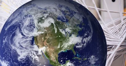 Close up of globe over close up of computer server against white technology Stock Photos