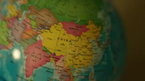 Close-up globe spins, highlighting China Stock Footage 342353295