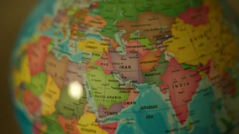 Close-up globe spins, highlighting Iran Stock Footage 341829594