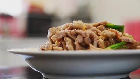 Close Up of Glossy Stir Fried Shredded Pork with Scallion Stock Footage 346488534