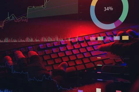 Close up of gloved hand typing on keyboard with financial charts and market.. Stock Photos