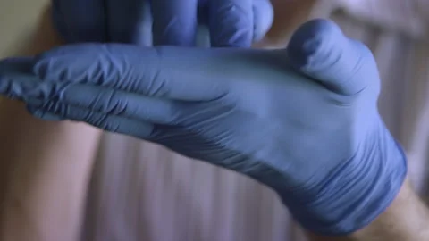 Close-up of gloved hands making moon walking motions Video stock 130397658