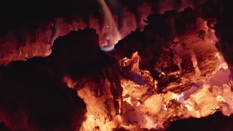 Close-up of glowing coals in a campfire. Video with sound. Stock Footage 313402874