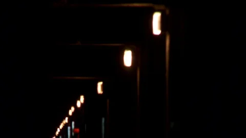Close up of glowing highway underpass lights, night. Vídeo Stock 107993735