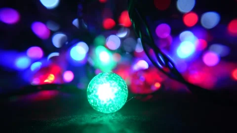 A close up of glowing string lights creating a dreamy bokeh backdrop Stock Footage 321549394