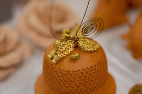 Close up of gold earring texture background Stock Photos