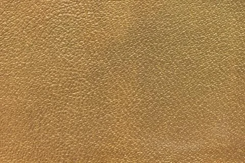 Close up of gold leather texture background Stock Photos